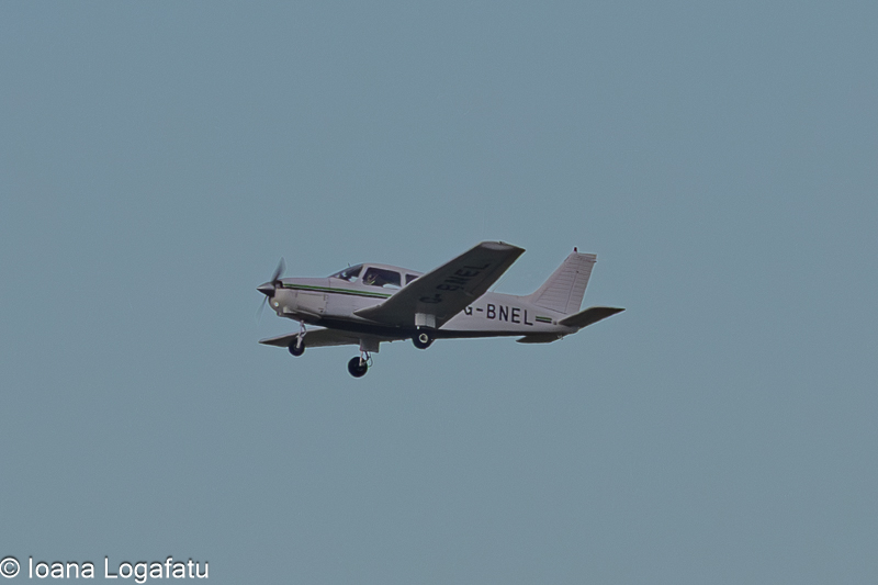Soaring airplane against a clear blue sky